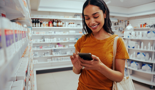 Patient in Oshkosh looking at teeth whitening options at pharmacy